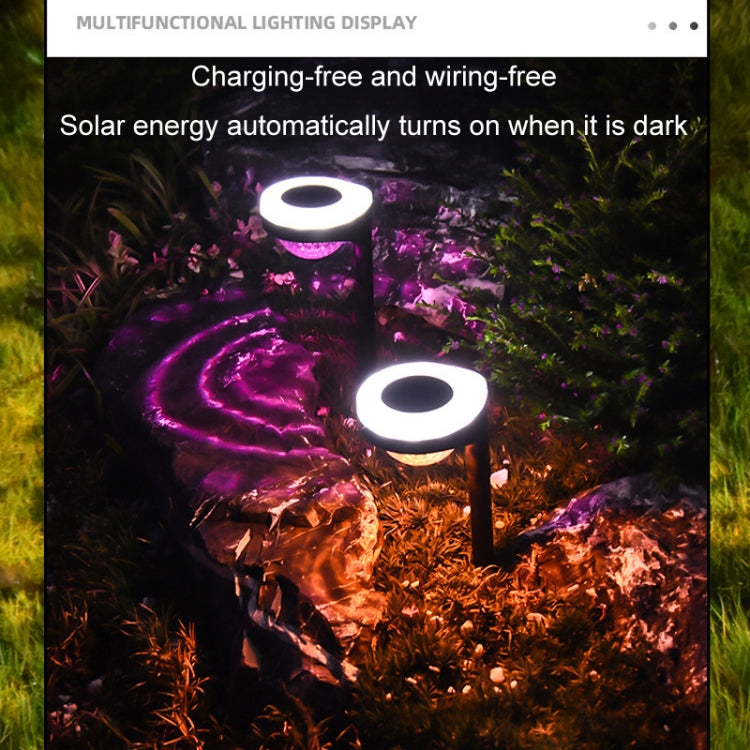 Luz LED solar para exteriores con enchufe de tierra y fuente de luz de dos colores.