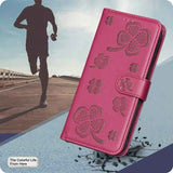 Four-leaf Embossed Leather Phone Case