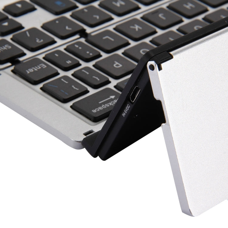 Teclado inalámbrico Bluetooth ultrafino F18 - Recargable, plegable, 58 teclas con soporte